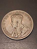 Obverse view showing King George V portrait and legend GEORGIVS V DEI GRA REX ET IND IMP