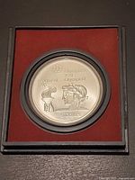 Coin in display case, full view