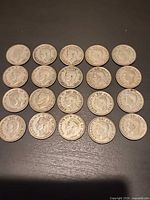 Twenty George VI Canadian dimes arranged 5×4
