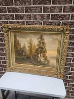 Full view of framed oil painting