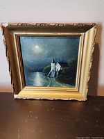 Framed oil painting overall view