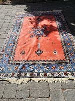 Full view of rug showing size, pattern, fringe