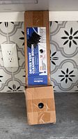 Full view of boxed Holikme dryer vent cleaning brush kit