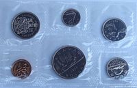 Obverse sides of six uncirculated 1982 Canadian coins in sealed pouch