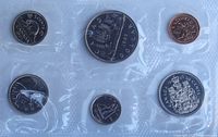 Obverse side of six uncirculated coins sealed in vinyl