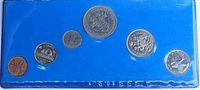 Obverse sides of six 1971 Canadian coins in clear sleeve against blue backing