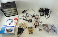 Overview of entire lot including organiser, Arduino boards, starter kit, tools, packaged components, breadboard and pneumatic cylinder