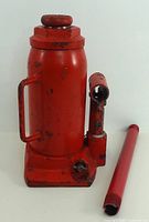 Jack front view with handle detached alongside base.
