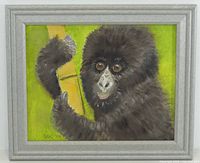 Frontal view of framed gorilla painting