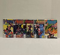 Front view showing all five bagged and boarded Avengers Spotlight comics issues 31-35