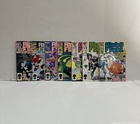 All seven Alpha Flight comics lined up