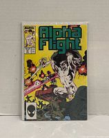 Front cover of Alpha Flight #51 in bag and board