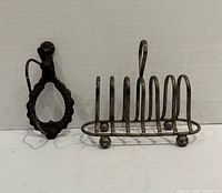 Receipt holder and toast rack front view