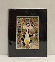 Front view of matted collage artwork