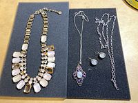 Group shot of all jewelry pieces on foam backing