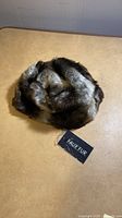 Top view of faux fur hat showing overall shape and coloration