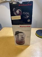 Sealed retail box showing KitchenAid branding and product image