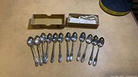 Full set of 12 teaspoons with two boxes