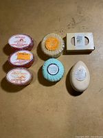 All seven soaps arranged on surface