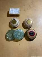 All six soaps arranged on surface