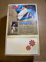 Top view showing Rubbermaid branding, Sidekick label, decorative motif