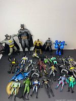 Group view of all standing and lying Batman figures