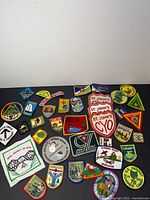 All patches spread on black surface showing variety