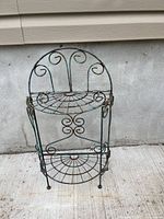 Full view of metal plant stand front