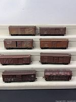 Eight boxcars on stepped display