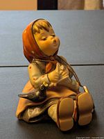 Front view of Goebel Hummel Happy Pastime figurine