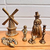 Group shot of all six brass items