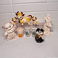 Group shot of all ceramic items in lot