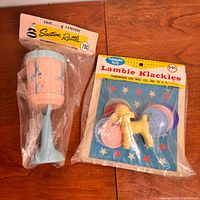 Both sealed 1960s baby toys in packaging