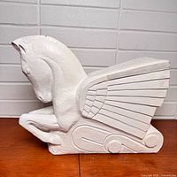 Left side view of Pegasus plaster sculpture