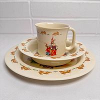 Cup, bowl, plate showing consistent Bunnykins design