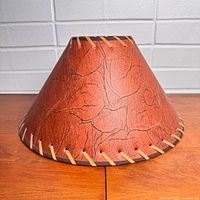 Exterior side view of brown leather-look lamp shade