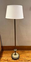 Full view of floor lamp with shade