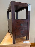 Full view of end table showing drawers and open shelf