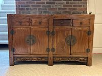 Front view showing overall credenza, drawers, cabinet doors, hardware