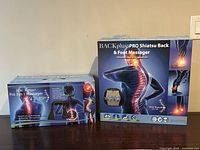 Both BACKplus massager boxes side by side