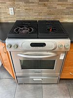 Front view of KitchenAid stainless gas range