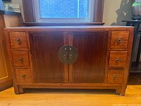 Front view showing full cabinet, drawers, doors and hardware