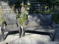 Loveseat and armchair front view on patio