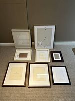 Group shot of all eight frames arranged on floor