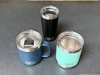 All three Yeti insulated mugs/tumblers with lids