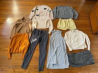 All ten garments laid out on floor