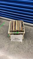 Crate containing approximately 15 vinyl LPs