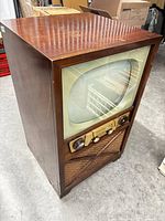 Front view of Admiral console TV showing screen, control panel and speaker grille