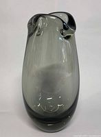 front view of smoked glass vase showing overall shape and color