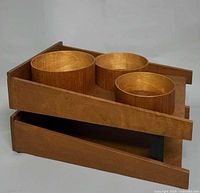 top view of letter tray with three teak bowls nested inside